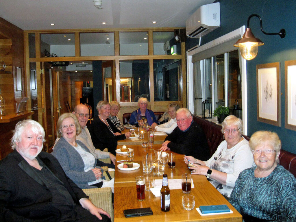 Supper Club, people around a table